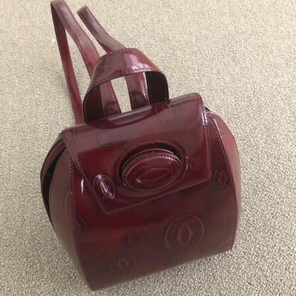 Cartier Handbags - Cartier maroon color bag